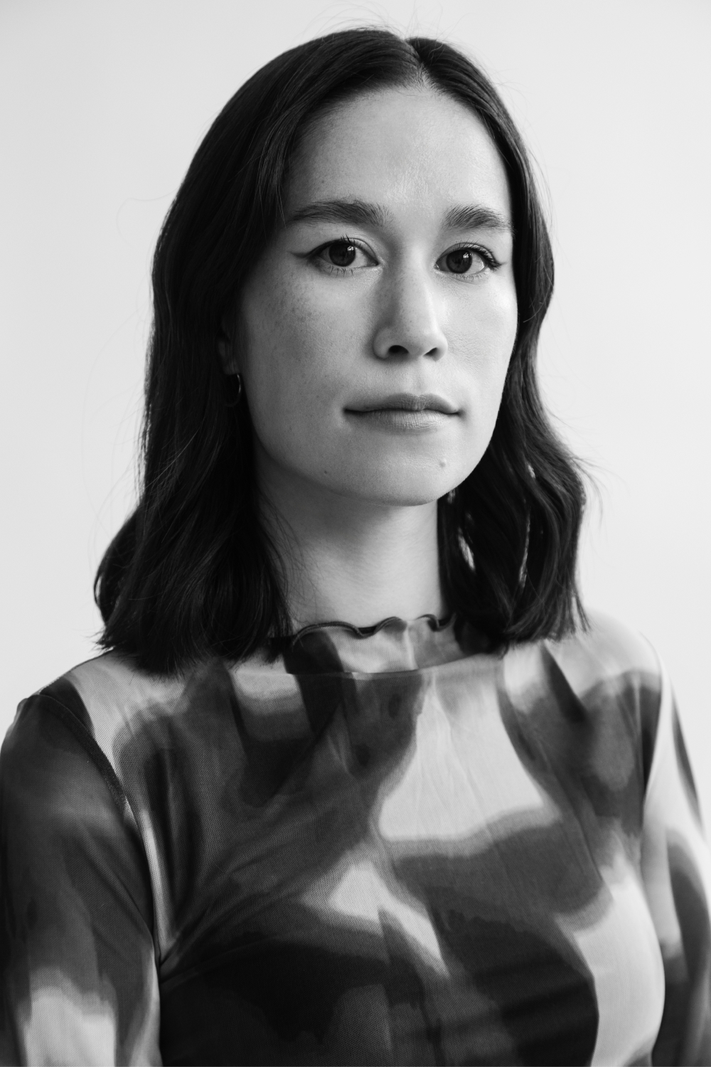 Black and white headshot of Sadie Fong Dame